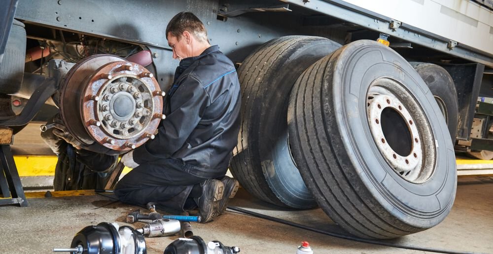 Diesel mechanic at work